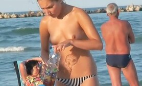 The charming amateur chick that I caught on the beach was in nothing but bikini panty