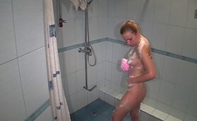 Lovely chick washing in the shower!